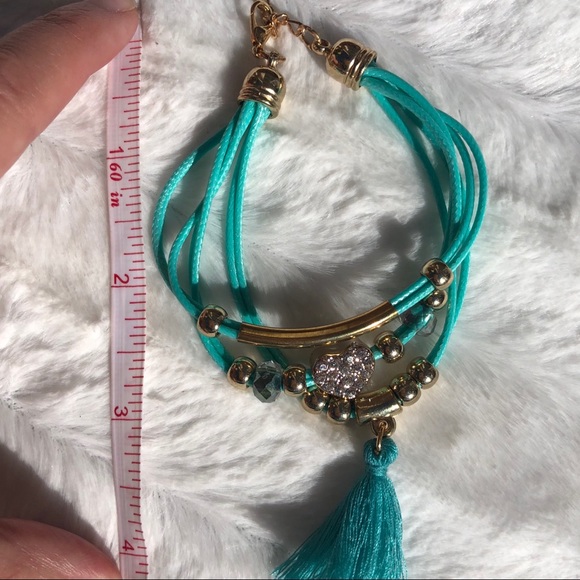 Beautiful teal banded bracelet with jeweled heart - Picture 7 of 11